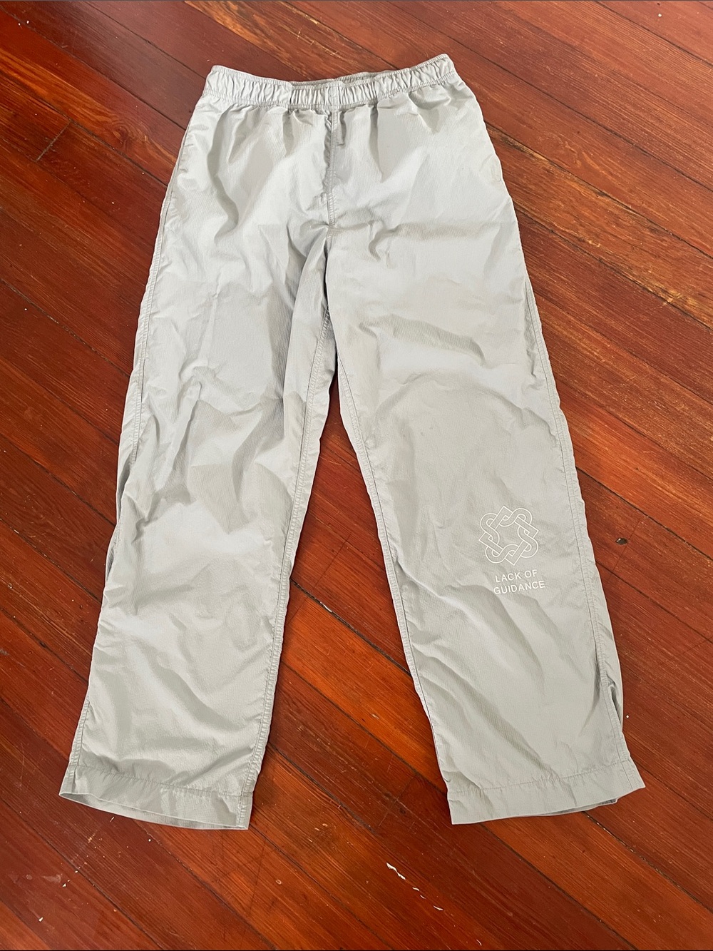 Women's Lack of Guidance Oliver track pant in grey nylon